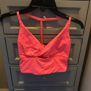 Triangle neon pink Lululemon sports bra